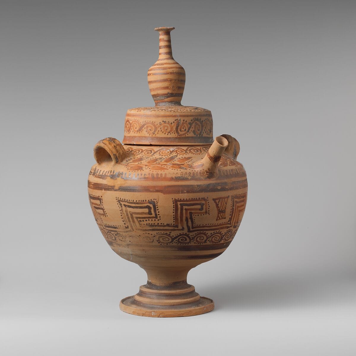 Terracotta spouted jar with lid - image 1
